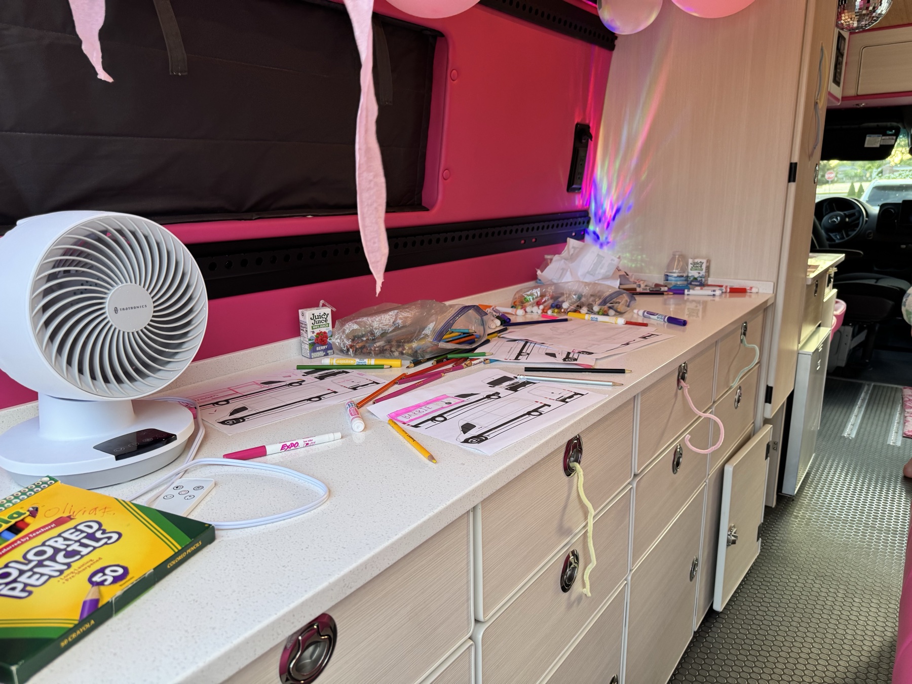 Creative birthday party activity station inside the Dream Van