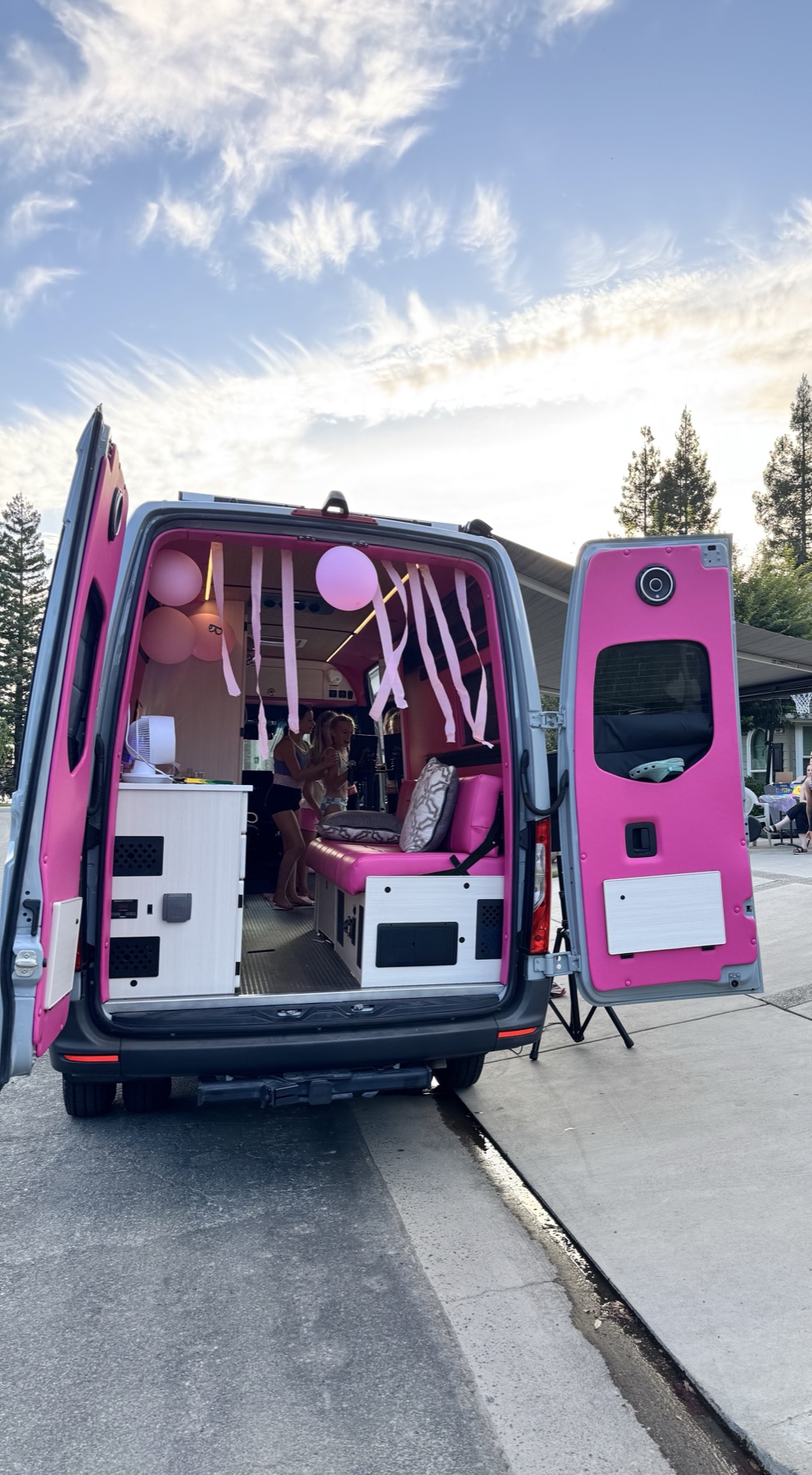 Dream Van mobile party rental arriving with its rear doors open for a California celebration
