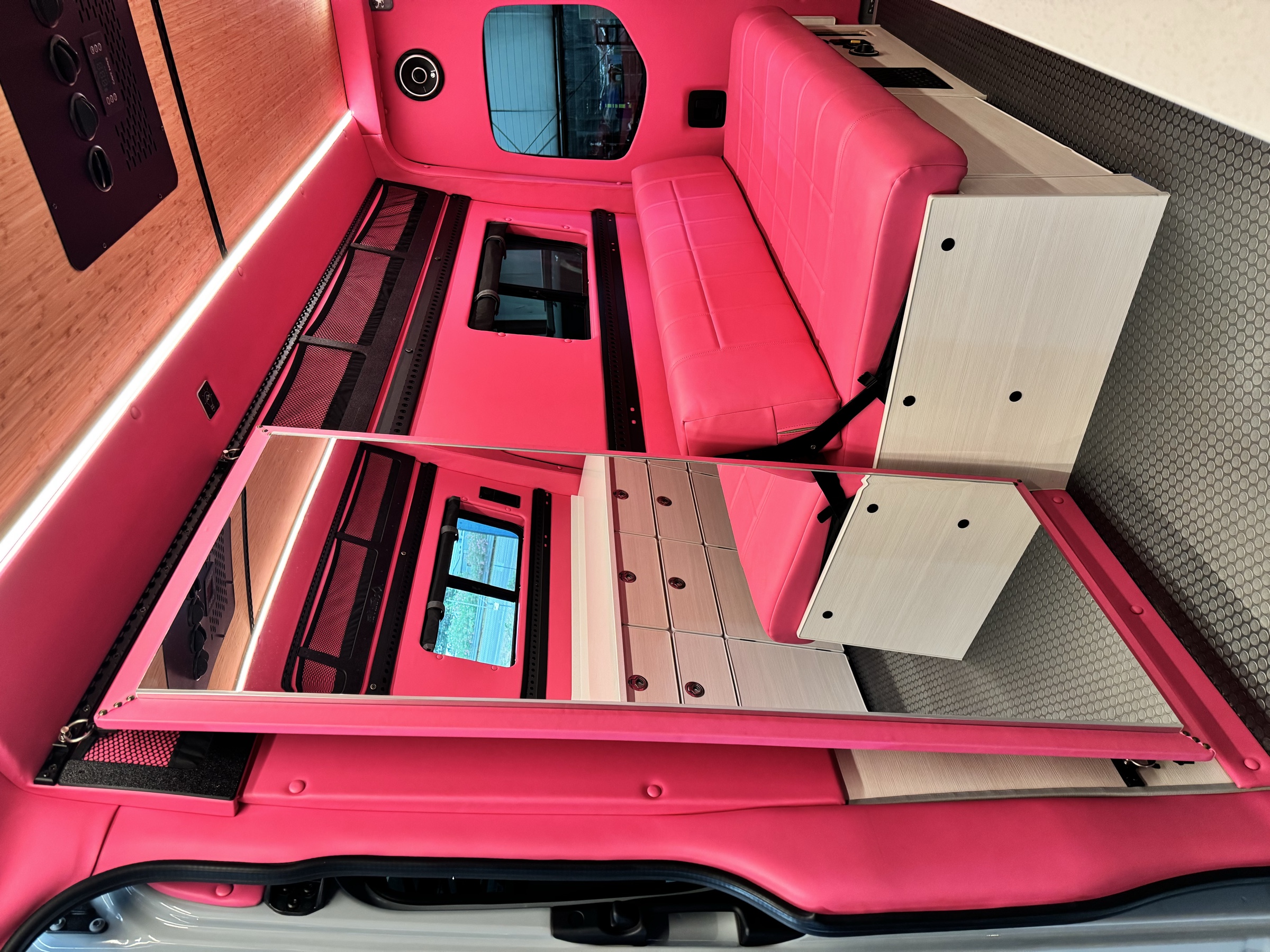 Bright pink Dream Van interior prepared for a private party