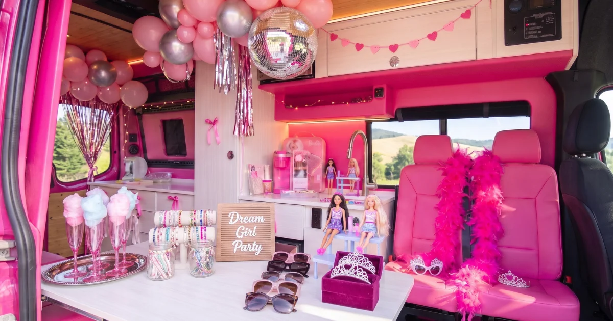 Dream Girl party setup with friendship bracelets, dolls, accessories, and pink seating